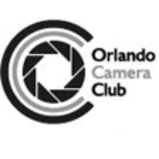 Logo of the Orlando Camera Club featuring a camera shutter design.